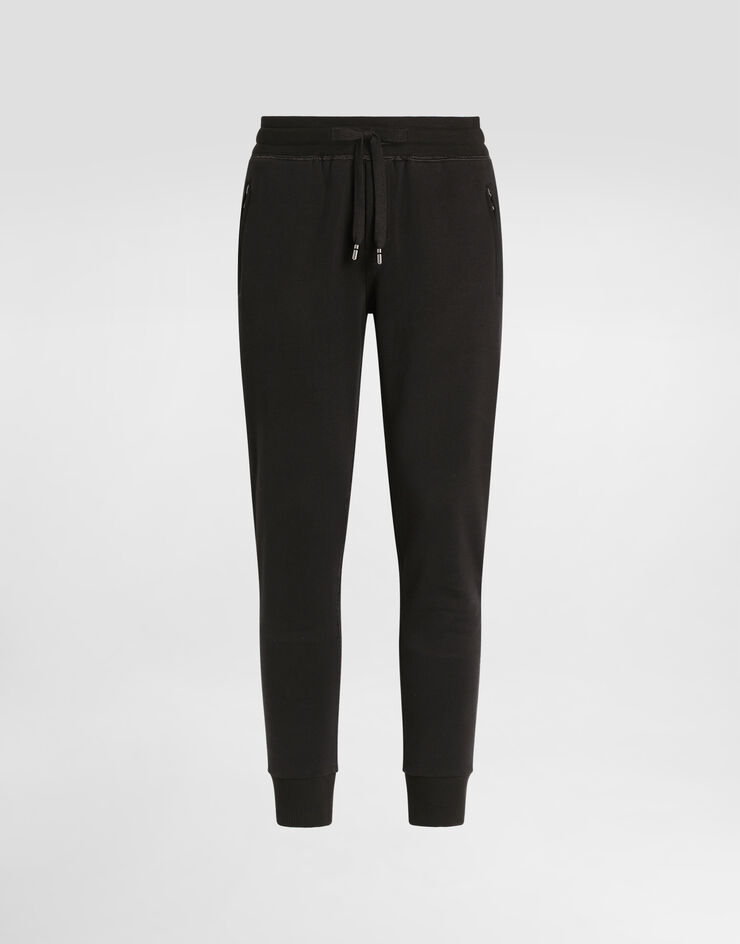 Dolce&Gabbana Pantalone jogging in jersey con placca logata Nero GVXQHTG7F2G