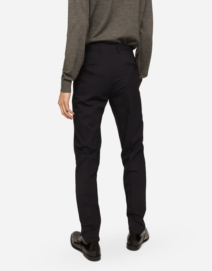 Dolce&Gabbana Rollkragenpullover Wolle mit Logoplakette Grau GXO35TJCVC7