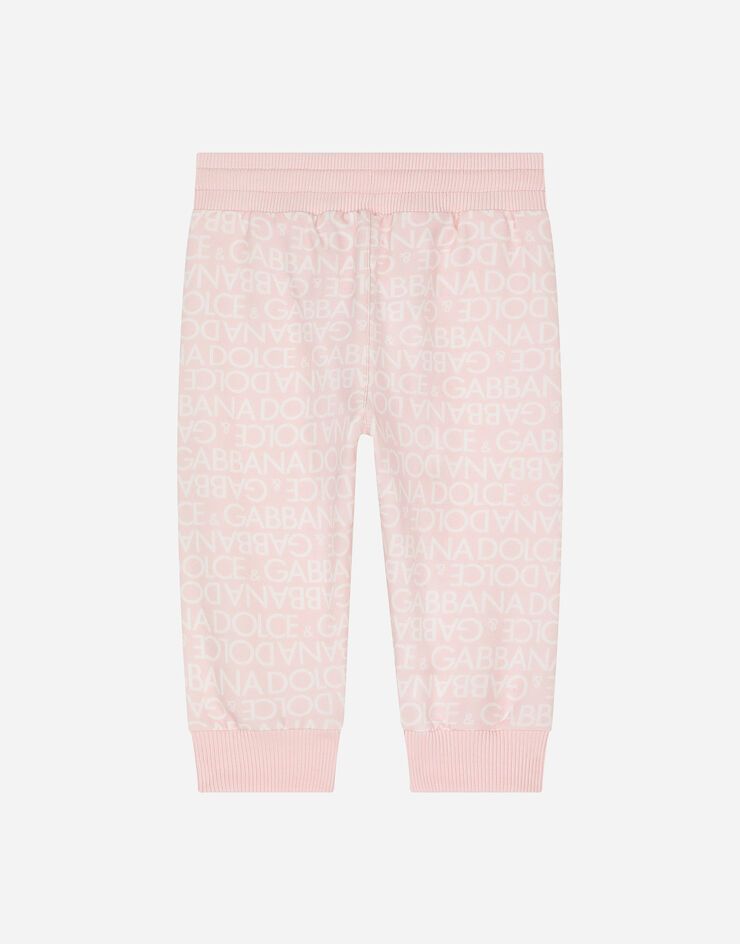 DolceGabbanaSpa Pantalón de chándal en punto con estampado Logomania Rosa L1JPIBG7KR1