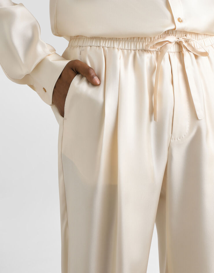 Dolce & Gabbana Silk twill jogging trousers Beige GP12QTFU10S