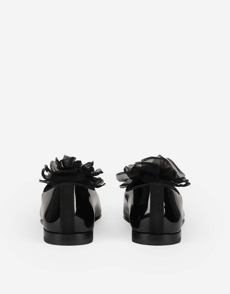 Dolce & Gabbana Patent leather slippers with flower appliqué Black A50645A3G48