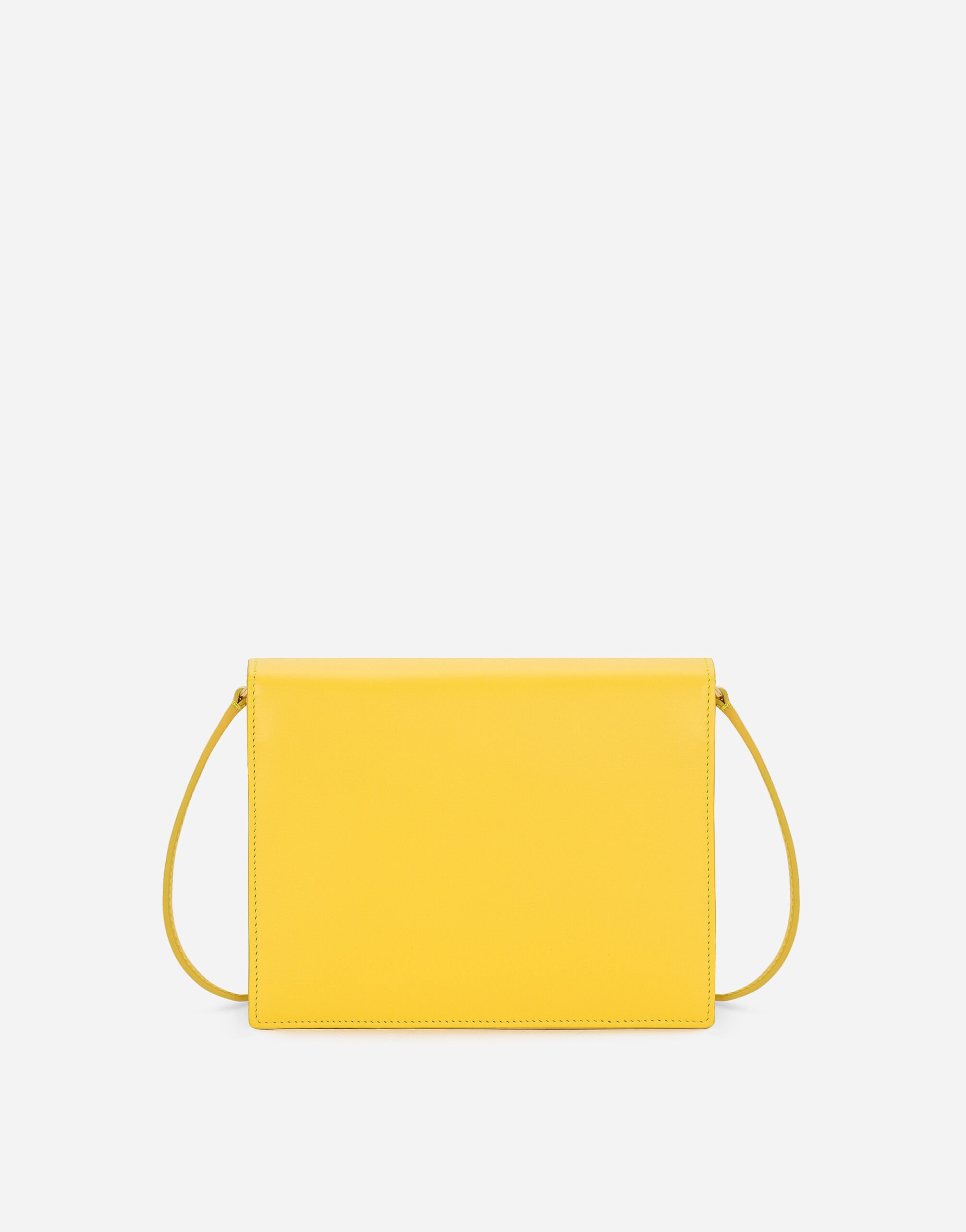 Calfskin DG logo crossbody bag in Yellow for Women Dolce Gabbana