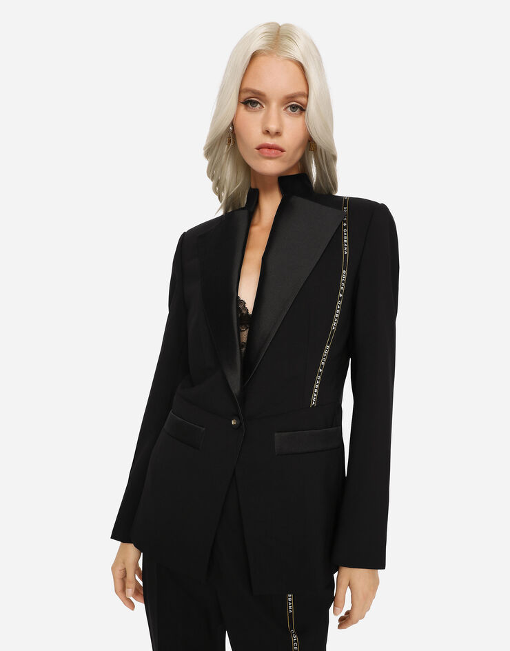 Dolce & Gabbana Chaqueta de cierre simple en tela de lana con el logotipo en el orillo Black F26COTFUBEF