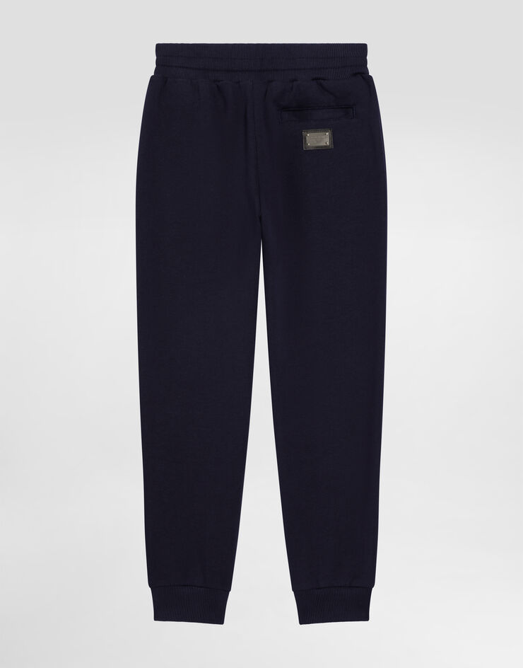 DolceGabbanaSpa Fleece trousers with DG logo plaque Blue L4JPT0G7I2P