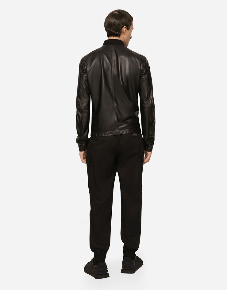 Dolce&Gabbana Blouson en cuir avec plaquette à logo Noir G9ZY5LHULR0