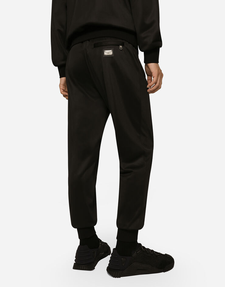 Dolce & Gabbana Pantalon de jogging en jersey technique avec plaquette Noir GVXQHTHU7B0