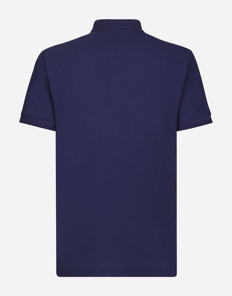 Dolce & Gabbana قميص بولو من قطن بيكيه بتطريز أزرق G8LZ1ZG7WUR