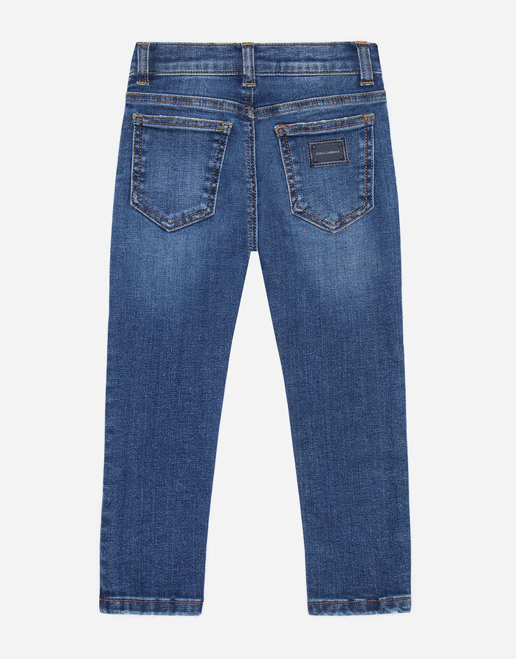Dolce & Gabbana Эластичные узкие джинсы темно-синего цвета СИНИЙ L41F96LD725