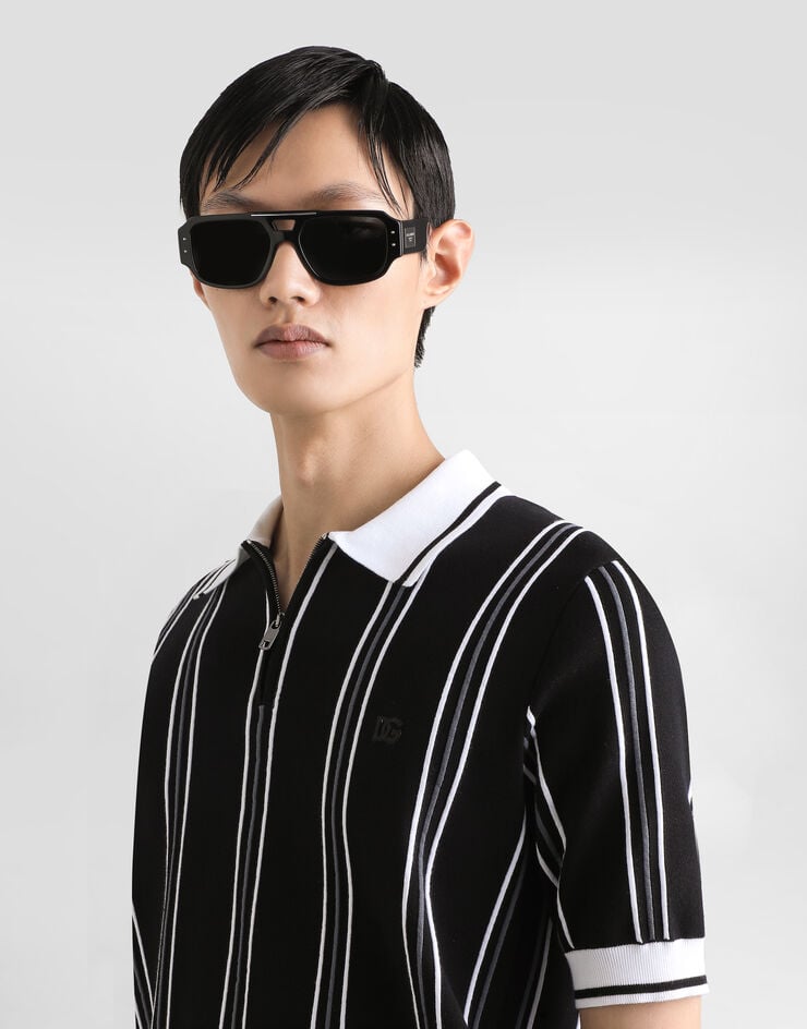 Dolce & Gabbana Poloshirt aus Baumwollstrick mit Intarsie Mehrfarbig GXZ92ZJBCHD