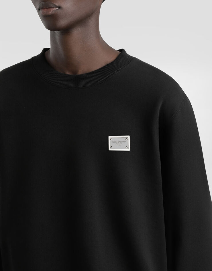 Dolce & Gabbana Sweat-shirt en coton avec plaquette Noir G9ABJTG7N7B