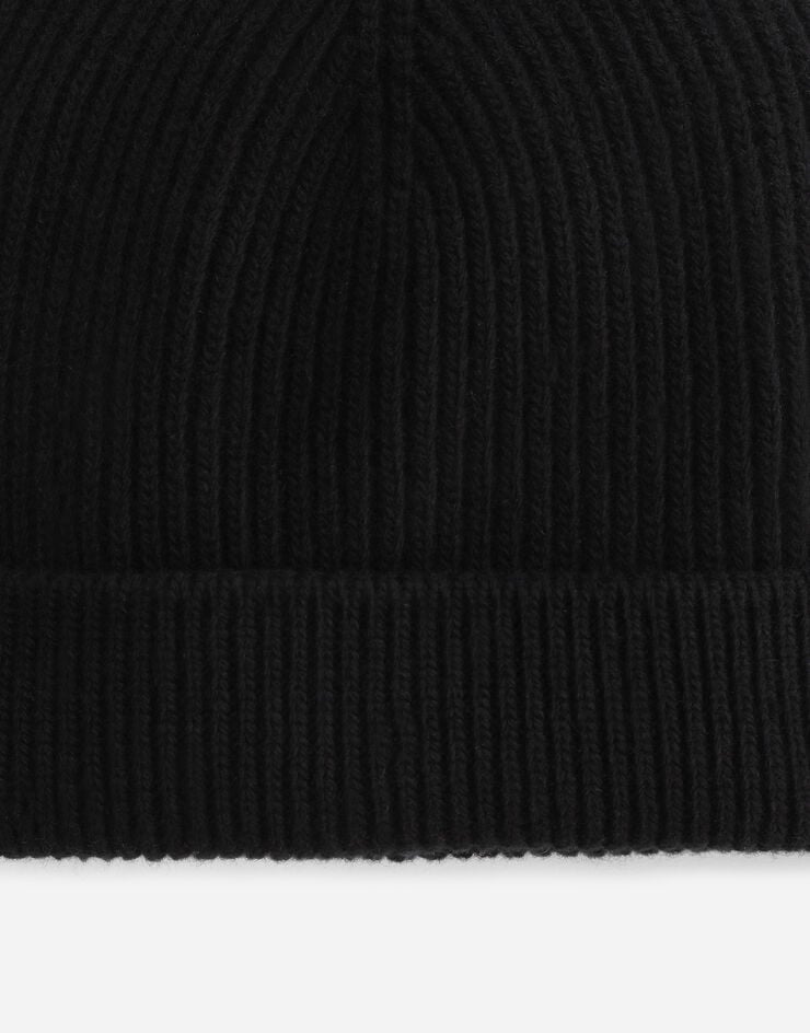 Dolce & Gabbana Cappello maglia di lana logo in pelle Nero GXE84TJAV99