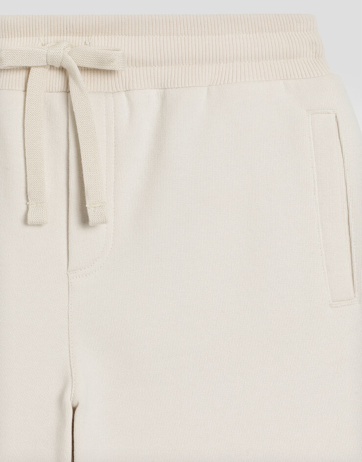 Dolce & Gabbana Fleece shorts with DG logo Cream L4JQR4G7O5B