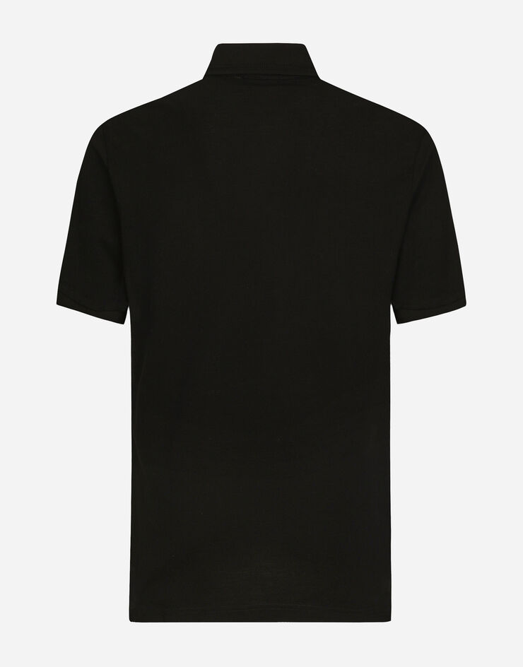Dolce & Gabbana قميص بولو من قطن بيكيه بتطريز أسود G8LZ1ZG7WUR