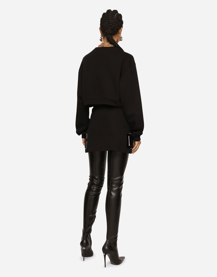 Dolce & Gabbana Minifalda de punto con parche de logotipo Negro F4CJRZHU7HV