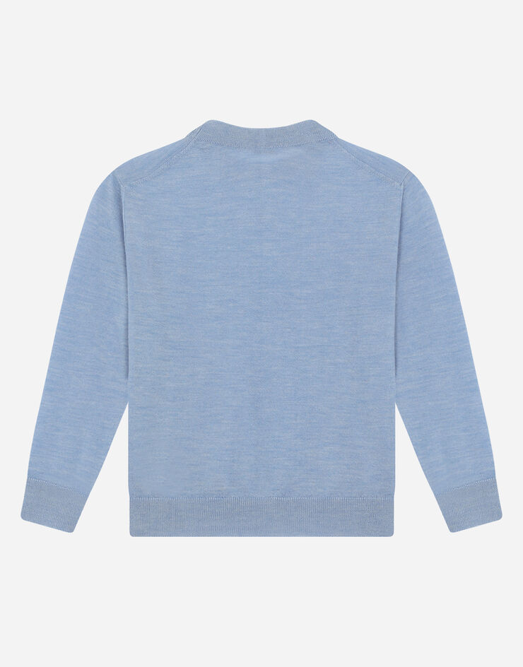 Dolce & Gabbana Pull ras de cou en cachemire à logo DG brodé Bleu Ciel L4KWB2JAWF3