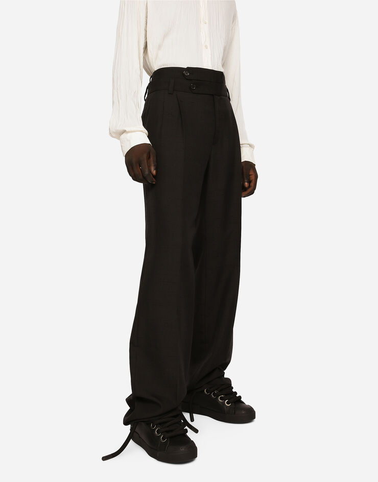 Dolce & Gabbana سروال محبوك من قطن وحرير شانتونغ أسود GVX8HTHUMCA
