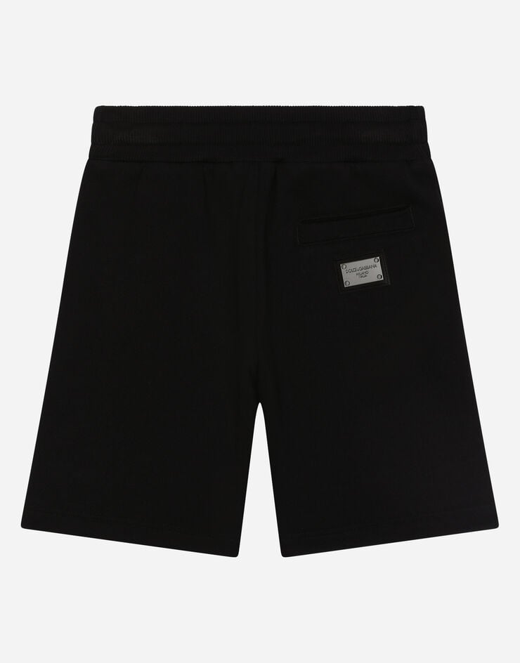 Dolce & Gabbana Bermudas de chándal en punto con placa con logotipo Negro L4JQD4G7I2P