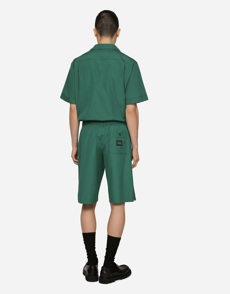Dolce & Gabbana Jogging-Bermudashorts aus Baumwolle mit Logoplakette Mehrfarbig GV37ATGF855