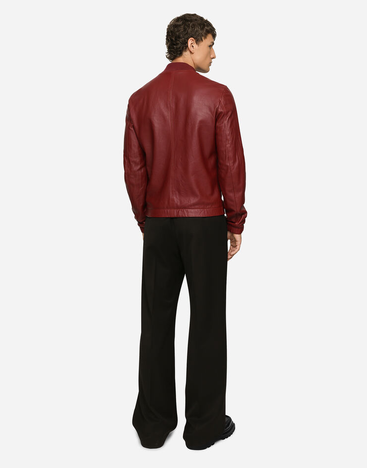 Dolce&Gabbana Blouson en cuir avec plaquette à logo Bordeaux G9ZY5LHULR0