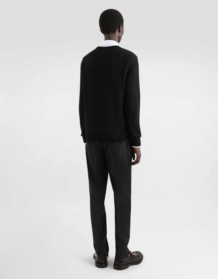 Dolce & Gabbana Wool round-neck sweater with branded tag Black GXO39TJEMQ4