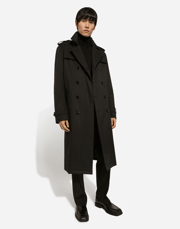 Dolce & Gabbana Zweireihiger Trenchcoat aus Nylon Schwarz G042RTFUS0D