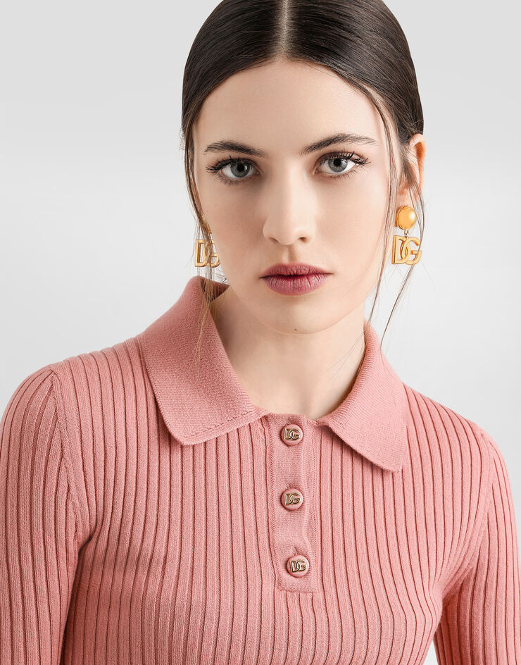 Dolce & Gabbana سترة طراز بولو من صوف مضلع وردي FXZ17TJCVXG