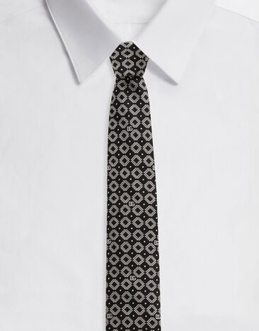 Dolce & Gabbana ربطة عنق من جاكار حريري بشعار DG أبيض GT147EG0UBU
