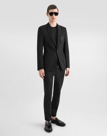 Dolce & Gabbana Pinstripe jersey jogging pants with DG patch Multicolor GVZAEZFRGBZ