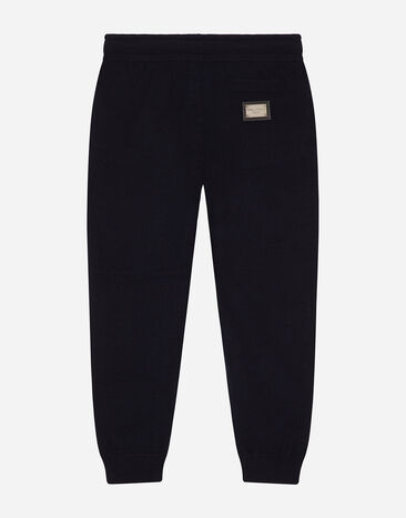 DolceGabbanaSpa Plain knit jogging pants with logo tag Blue L4KP08JCVM4