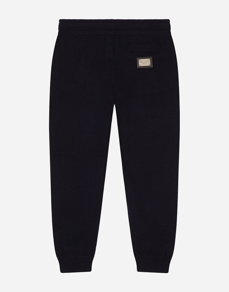 DolceGabbanaSpa Pantalón de chándal en punto liso con placa con logotipo Bleu L4KP08JCVM4