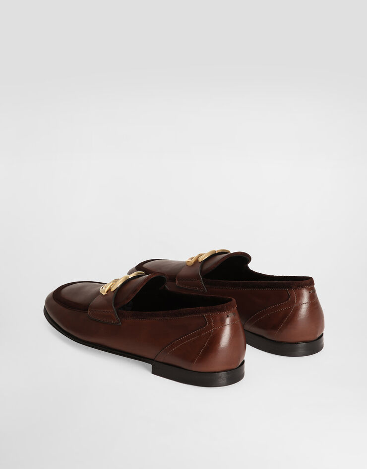 Dolce & Gabbana Calfskin slippers Brown A50462AQ993