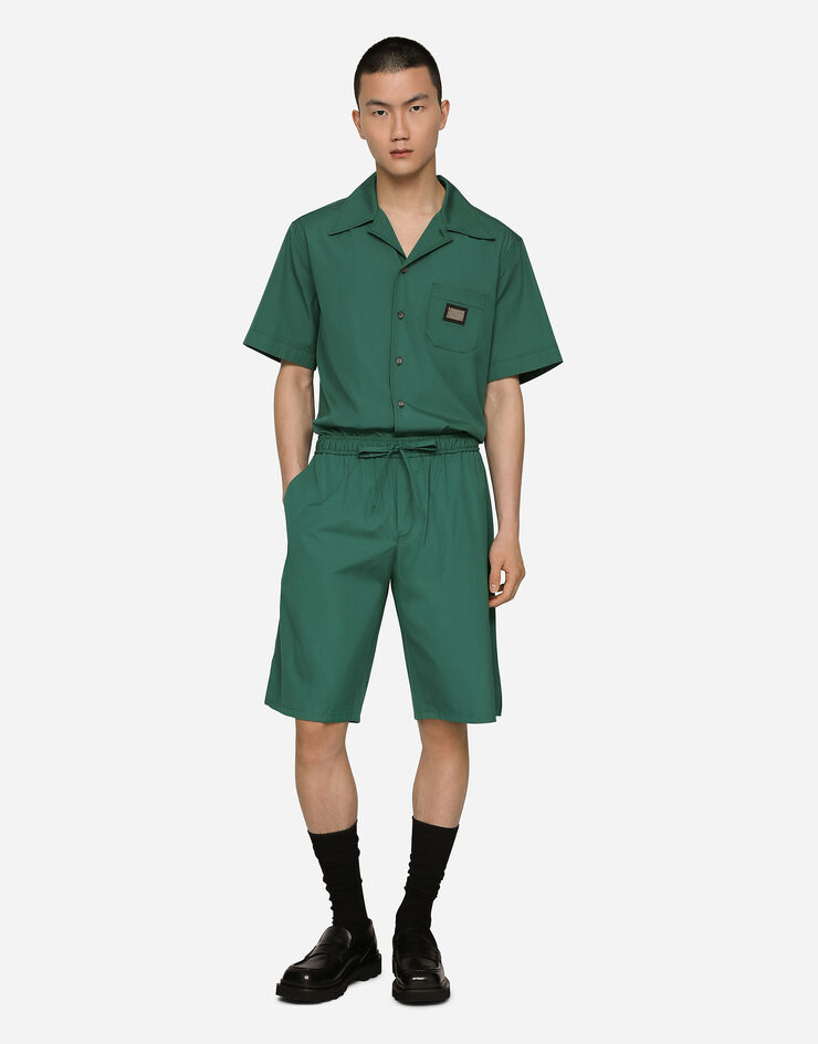 Dolce & Gabbana Jogging-Bermudashorts aus Baumwolle mit Logoplakette Mehrfarbig GV37ATGF855