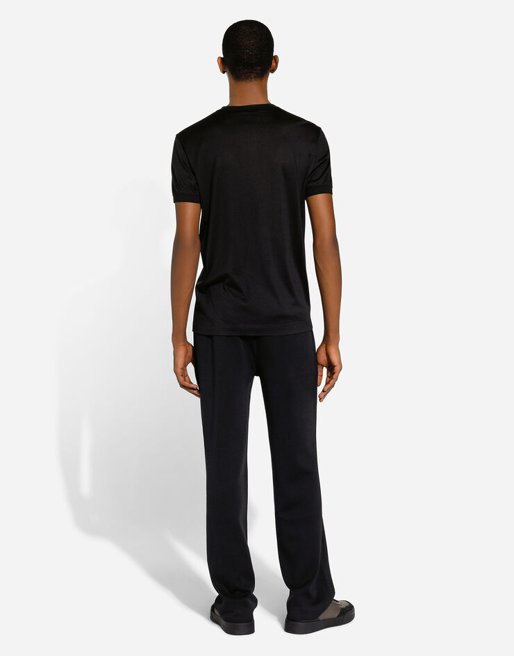 Dolce & Gabbana سروال للركض صوف أسود GXU16ZJFMCZ
