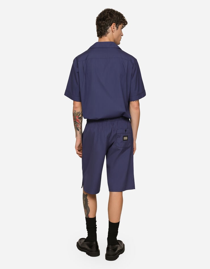Dolce & Gabbana Cotton jogging shorts with logo tag Blue GV37ATGF855