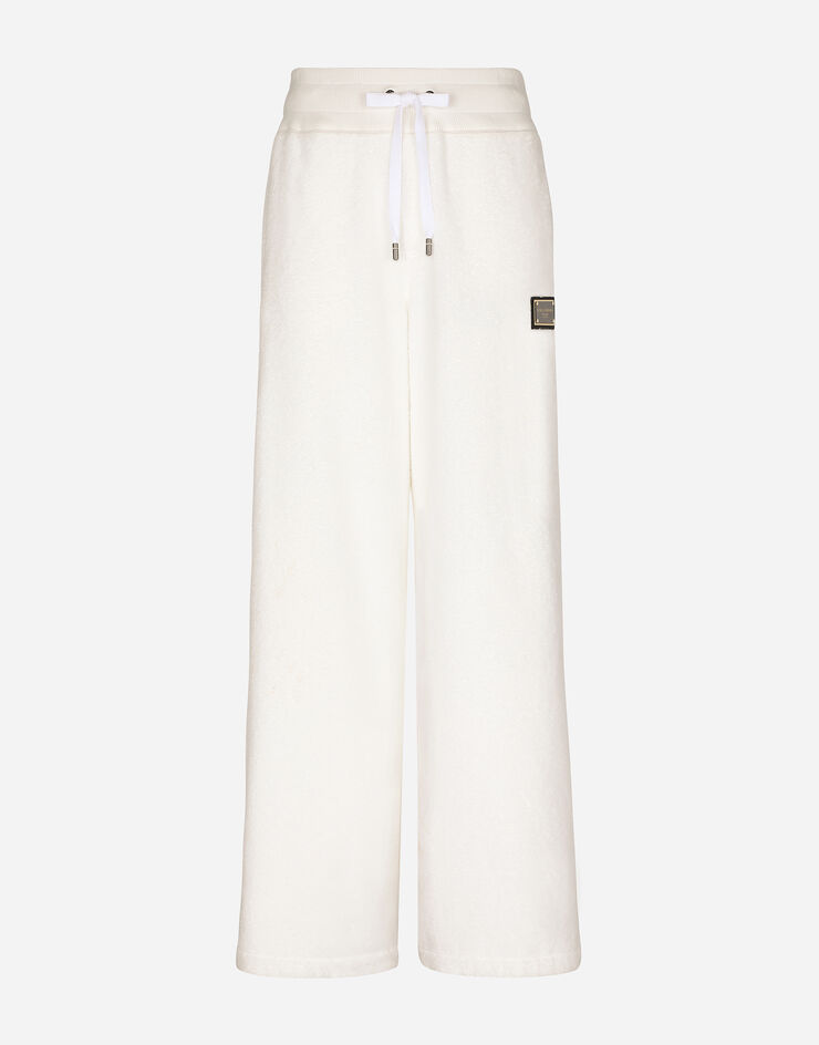 Dolce & Gabbana Pantalone jogging in spugna con placca logata Bianco GVZ7ATHU7OC
