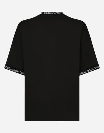 Dolce & Gabbana Short-sleeved cotton T-shirt with all-over logo Black G8RK1THU7MA
