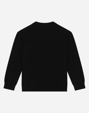 Dolce & Gabbana Round-neck knit pullover with logo tag Black L4KW22JCVD7