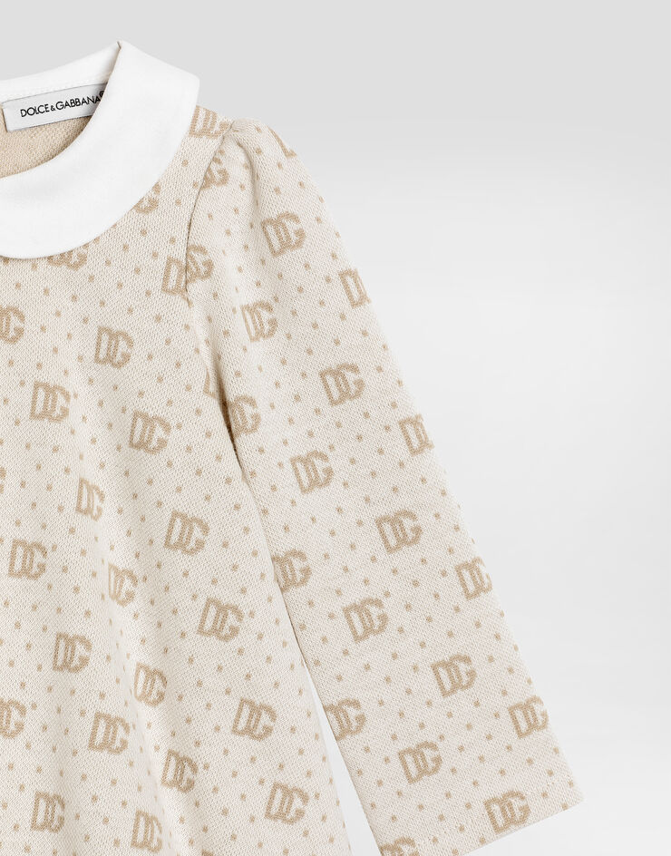 Dolce & Gabbana Kleid aus Jacquardstrick mit DG-Logo und Punkten Multicolor L2JD9SFJ7EA