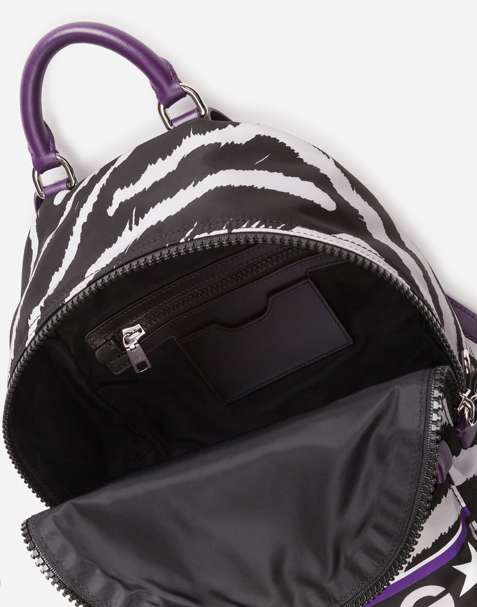 Nylon vulcano backpack with jungle print over a purple base