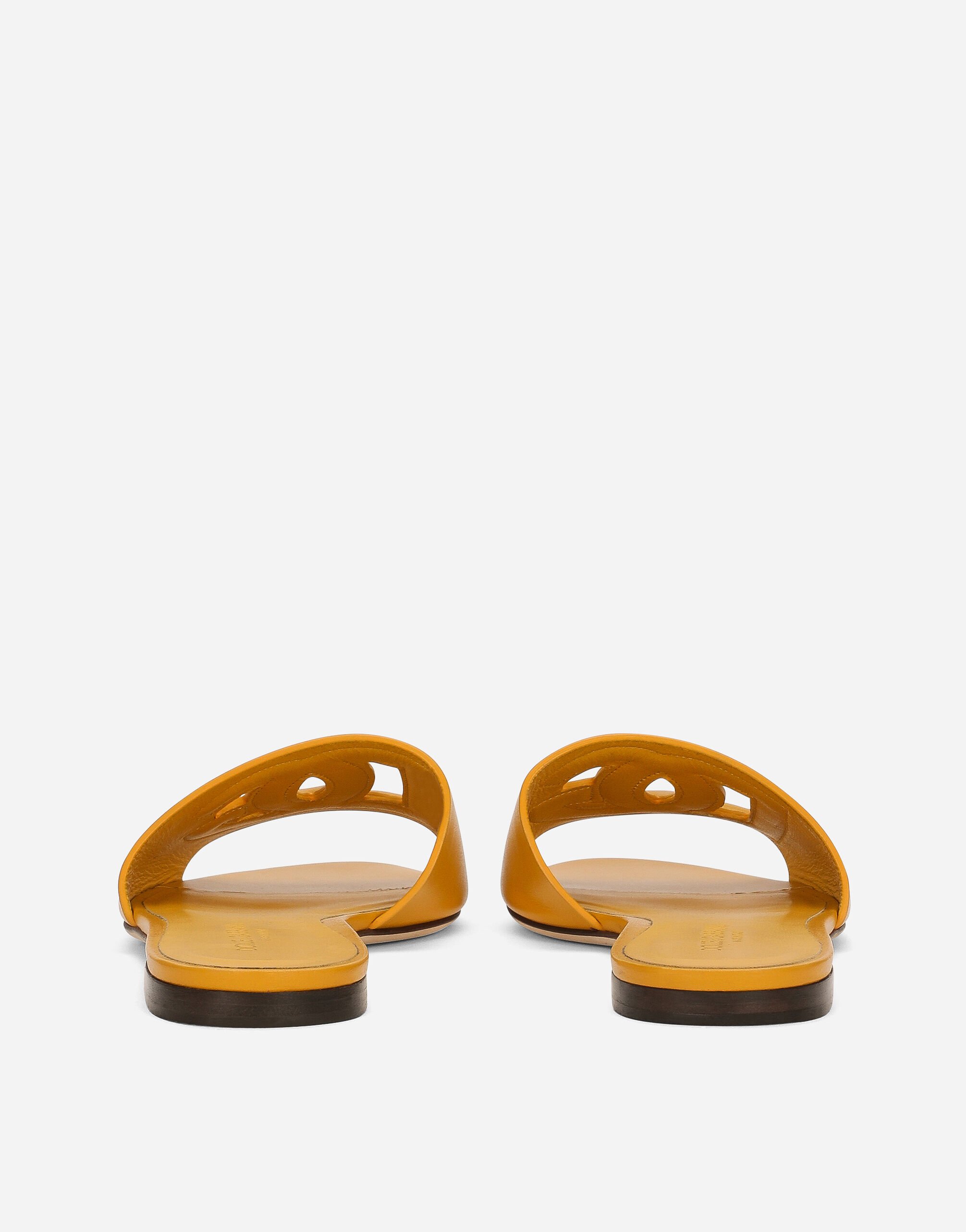 Calfskin slides with DG logo in Yellow for Women
