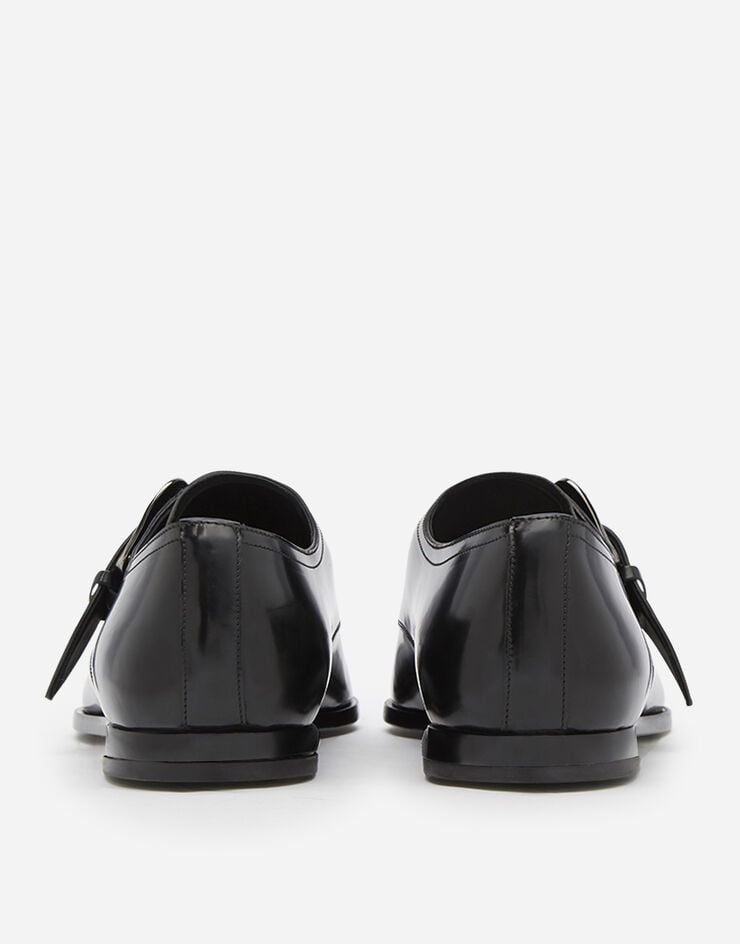 Dolce & Gabbana Slippers in star calfskin Dolce & Gabbana Slippers in star calfskin SCHWARZ A50375AA384