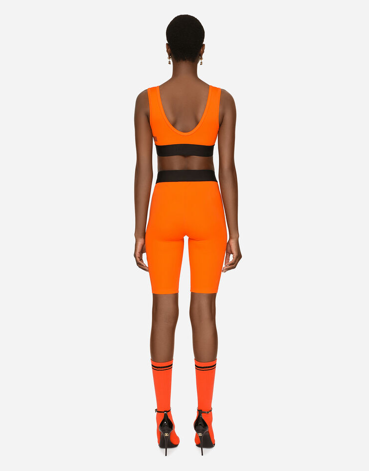 Dolce & Gabbana Bralette-Top aus maschenfestem Jersey mit Print DGVIB3:<br>• Orange<br>• Gerader Ausschnitt<br>• Enge Passform<br>• Ungefüttert<br>• Der Artikel hat bei Größe 40 IT eine Länge von 9 cm ab der hinteren Mitte<br>• Das Model ist 175 cm groß und trägt Größe 40 IT<br>• Made in Italy DGVIB3 Orange F79BWTG7K6V