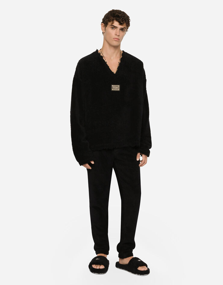 Dolce & Gabbana Брюки-джоггеры из махровой ткани с пластинкой черный GV1IATHU7OC