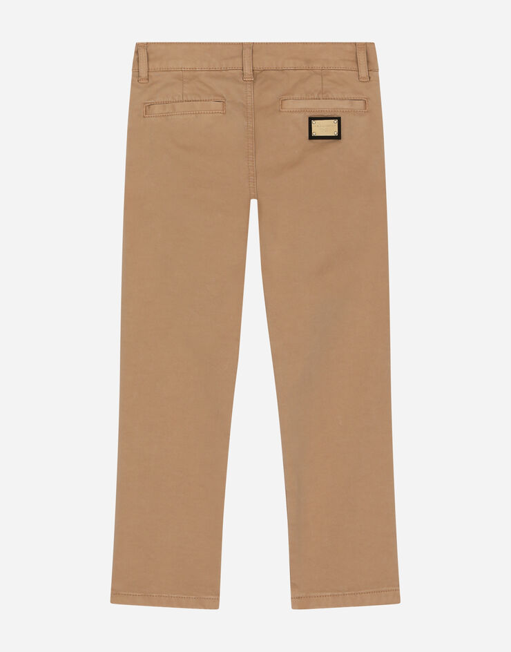 DolceGabbanaSpa Classic plain-knit cotton pants with logo tag Beige L44P31LY072