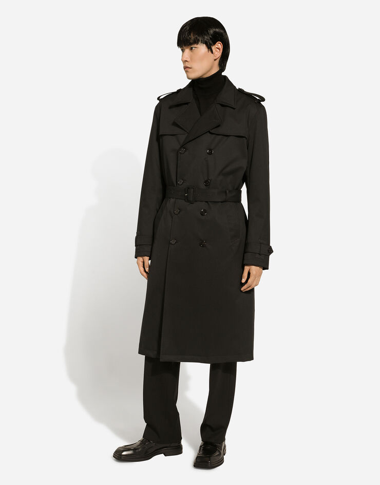 Dolce & Gabbana Zweireihiger Trenchcoat aus Nylon Schwarz G042RTFUS0D