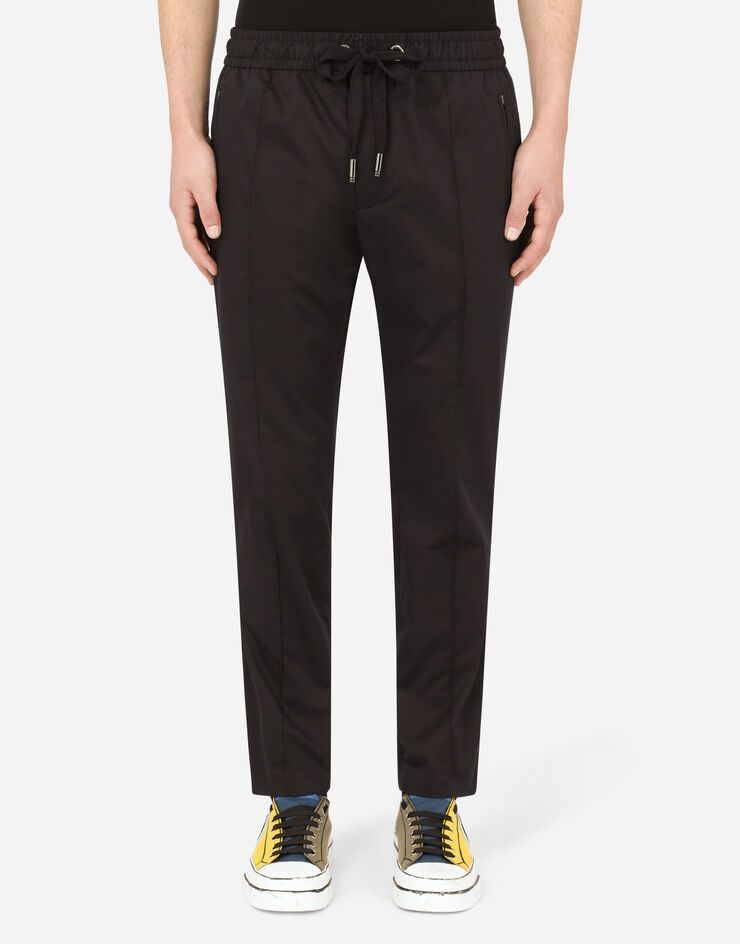 Dolce & Gabbana Stretch cotton jogging pants with plate Blue GYACETFUFJR