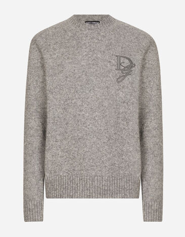 Dolce & Gabbana Pull ras de cou en laine à broderie DG Gris GXX02ZJFMIM