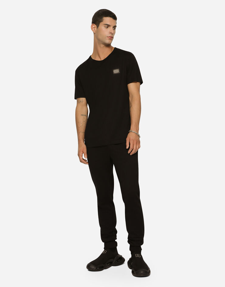 Dolce&Gabbana Pantalon de jogging en jersey avec plaquette à logo Noir GVXQHTG7F2G