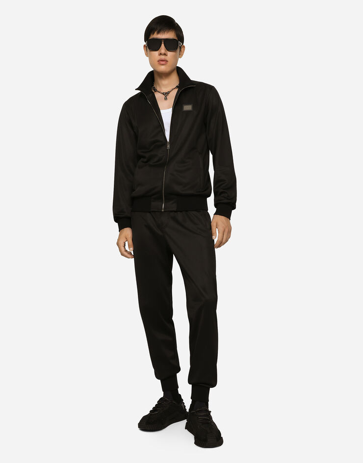 Dolce & Gabbana Felpa jersey tecnico con zip e placca logata Nero G9ABKTHU7B0