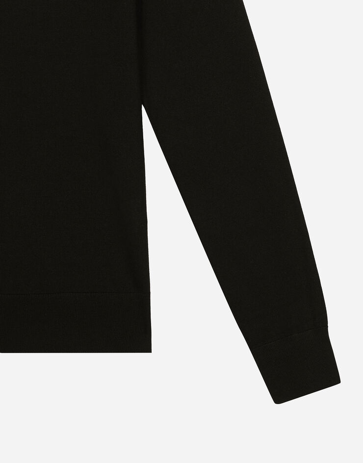 Dolce & Gabbana Jersey de cuello redondo de seda con logotipo Dolce&Gabbana Negro GXX02ZJBSJS
